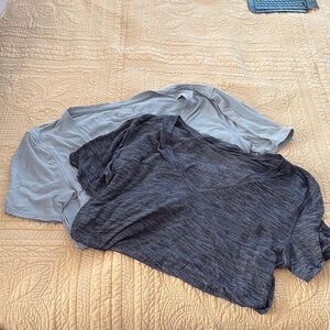 Lululemon bundle of 2 -Gray pin stripes and Black Heather V-Neck T-Shirts size 6